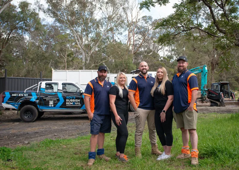 Rovs - Reliable Rubbish Removal Team of business people smiling at the camera